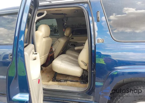 2001 Chevrolet Suburban 1500 Ls z USA, uszkodzony, nr VIN 3GNEC16T21G126434